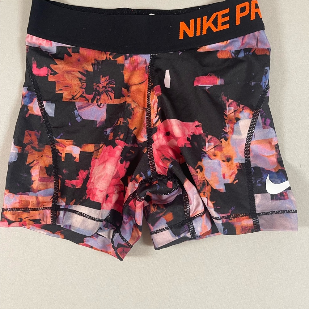 Nike Black and Orange Athletic Shorts with Dynamic Design